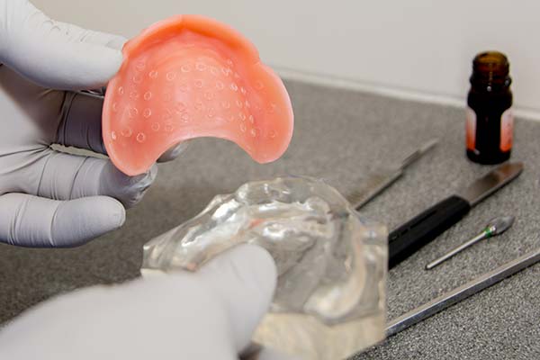Suction cup dentures manufacture